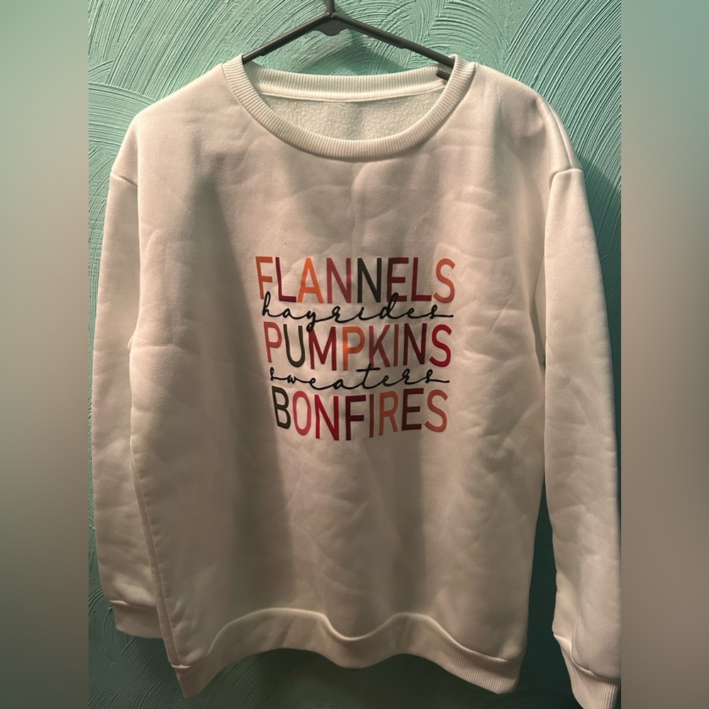 “Flannels hayrides pumpkins sweaters bonfires “
Sweatshirt